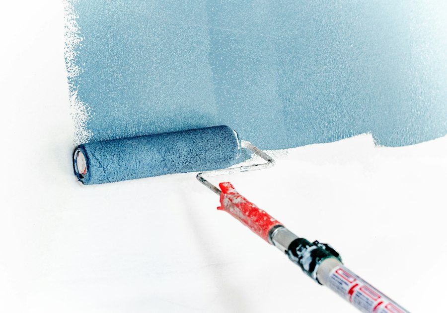 Wall being painted with a roller